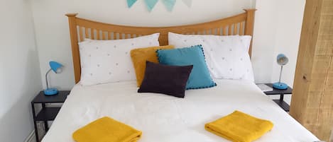 Luxurious king size bed with sustainable bedding-enjoy a good night's sleep 