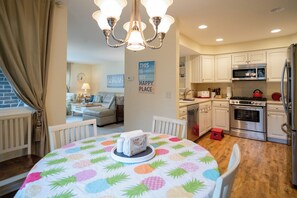 Fully Stocked Kitchen with Dining Table and Seating for 4