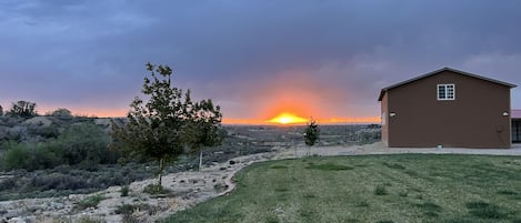 Enjoy the beautiful sunset from the outdoor dining table