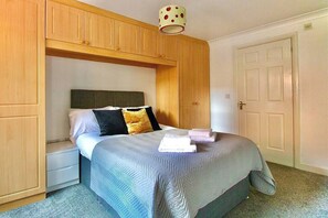 Stylish Double Bed in a cozy private bedroom with an ensuite.