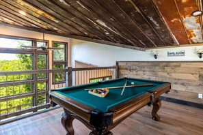 Come together for a round of pool in our breezy, open-air loft!