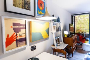 A dedicated desk space with reading lights and free Wi-Fi offers the perfect spot for work, study, or simply staying connected during your stay.