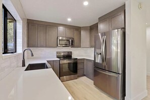 Completely remodeled kitchen. Stocked with everything you will need for cooking