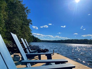 Lodge- comfortable chairs and sun umbrella and swimmer ladder.