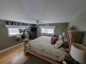 Spacious bedroom with king size bed.