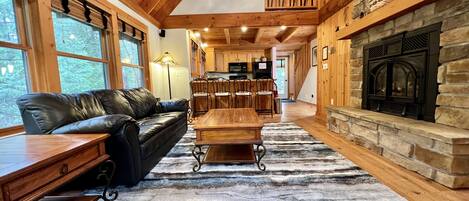 View of open concept kitchen & living areas. Lofted second floor.