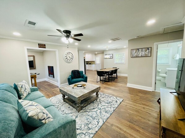 Relax, get comfortable and enjoy family and friend time in the large living room