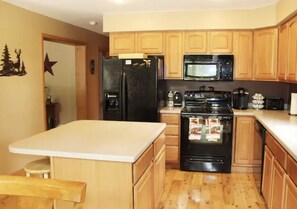 Well appointed kitchen with all the pots/pans you need.  Keurig and Drip Coffee