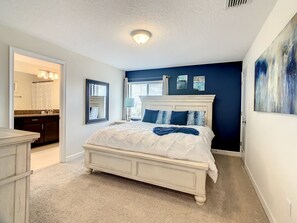 Upstairs Back of House Master Bedroom with King Bed and Ensuite