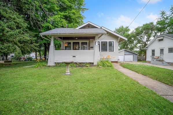 Charming 1920 bungalow on a large corner lot with ample driveway and parking