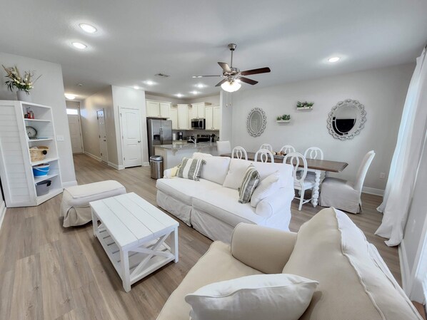 Great open space between the kitchen, living room, and dining table to chat with family and friends while making memories.