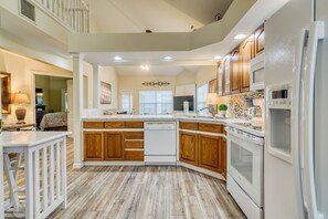 large kitchen is stocked with everything you might need