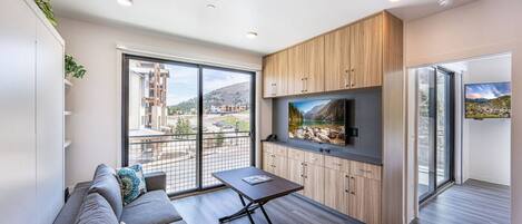 The living room has 8' glass doors that give you stunning mountain views!