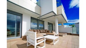 LARGE TERRACE WITH VIEWS OF GOLF COURSE & SEA 