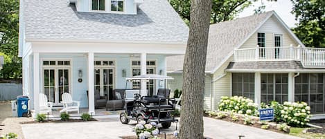 Two parking spots and space for the golf cart