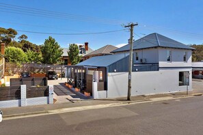 This apartment is situated in a building with two other rental units and offers free street parking.