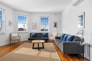 Curl up on the comfortable lounges with a spot of TV in the living area.