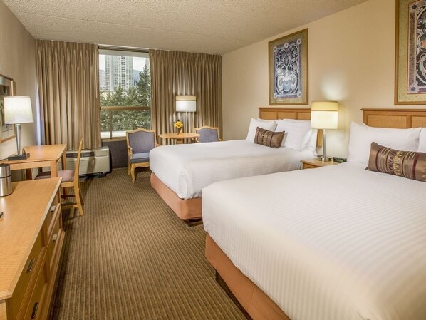 Bedroom with Two Double size beds. The exact unit will be assigned upon arrival. Views, colors, and decor may vary