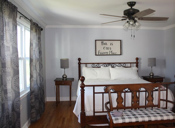 Master bedroom with a king bed.