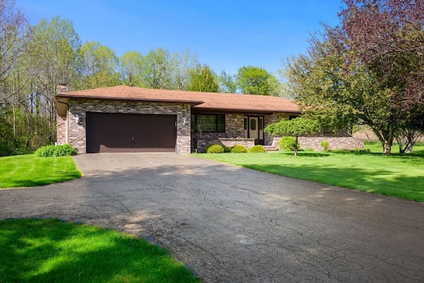 Peaceful Penfield home on four acres!