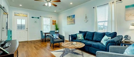 Sit back and relax after a day at the beach in the living room.