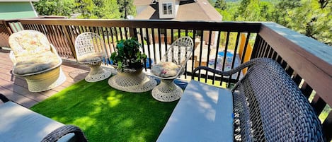 Beautiful deck with lots of furniture to relax on and enjoy the Mountain views!