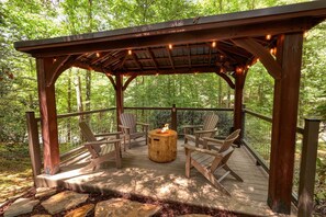 Large covered deck with fire pit