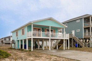 Ample parking space under the house to park your cars and a picnic table to enjoy the outdoors.