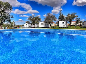 Cloud, Water, Sky, Building, Property, Plant, Swimming Pool, Blue, Nature, Natural Landscape
