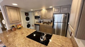 Kitchen with washer/dryer in the entryway