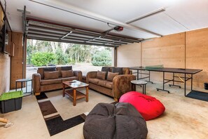 Kick back on comfy couches, challenge your mates to table tennis, or enjoy a film night on the big screen Smart TV.