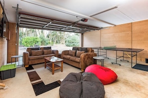 Kick back on comfy couches, challenge your mates to table tennis, or enjoy a film night on the big screen Smart TV.