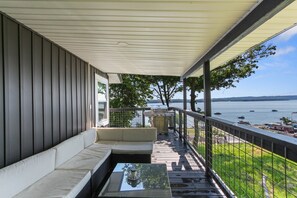 Covered Side Porch with outdoor seating and River and Marina Views