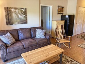Comfortable seating with bedroom beyond