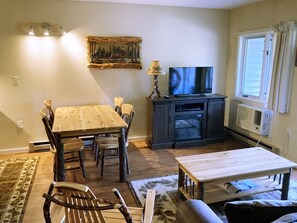 TV and electric fireplace make it extra cozy