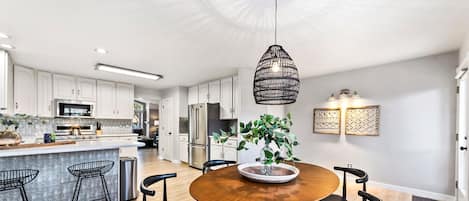 Kitchen and Dining Area with Peekaboo of Living Area