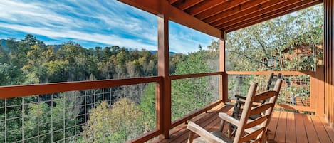 Take in the breathtaking views from the private deck—your tranquil escape with nature right at your doorstep.