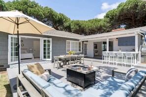 Outdoor area with dining area and firepit