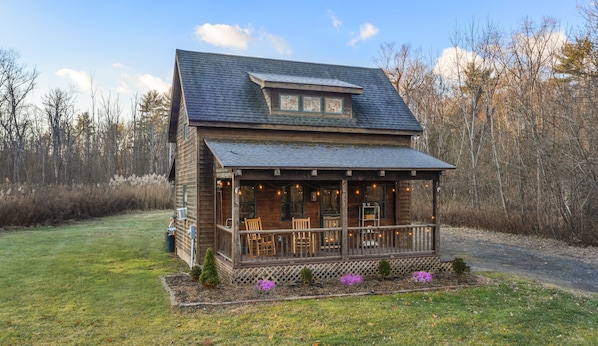 View of the cabin from the road. Sitting on just over an acre of land.