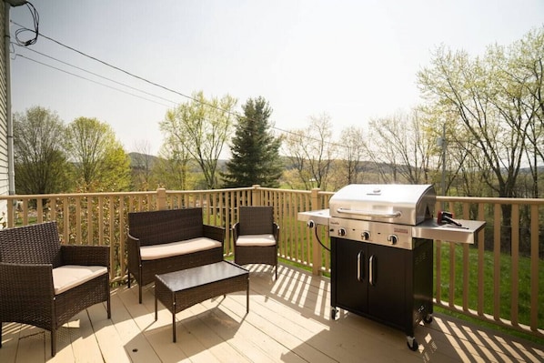 Grill & seating on porch