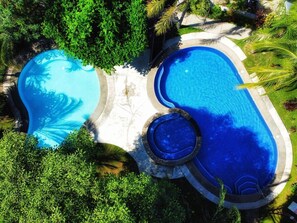Looking down on the 2 community pools in the Jade Beach C complex.