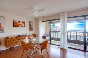 Large dining area with partial ocean views.