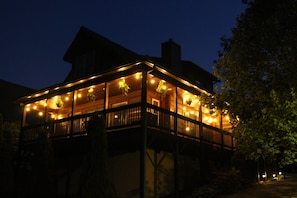 Enjoy the expansive wrap-around porch as you take in views of the Great Smokies.