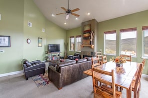 Great room with cozy fireplace and amazing views