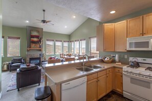 Well stocked kitchen that opens to great room for cooking and entertaining 