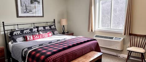 Sleep well in our comfy King Bed while enjoying the Mountain View!