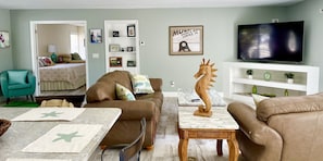 Large open living/dining/kitchen area.
