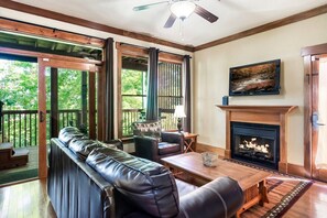 Our spacious living area offers a relaxing atmosphere for family gatherings, romantic getaways, or peaceful evenings after a day of adventure in the Smoky Mountains.