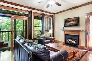 Our spacious living area offers a relaxing atmosphere for family gatherings, romantic getaways, or peaceful evenings after a day of adventure in the Smoky Mountains.