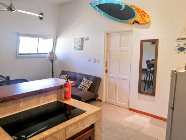 Kitchen and Living area with high ceilings. 